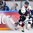 ST. PETERSBURG, RUSSIA - MAY 17: Slovakia's Marek Bartanus #61 battles along the boards with USA's Brady Skjei #76 during preliminary round action at the 2016 IIHF Ice Hockey World Championship. (Photo by Minas Panagiotakis/HHOF-IIHF Images)

